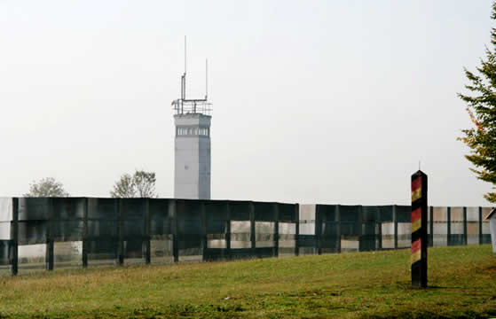 watchtower behind a fence