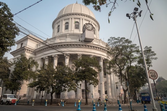 large classical building with columns and a dome
