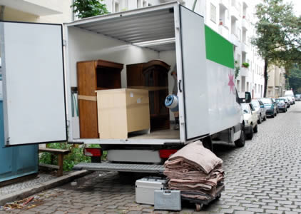 A half-loaded moving van