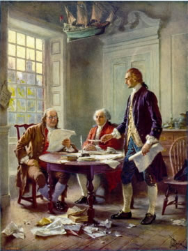 Three men around a table drafting a text