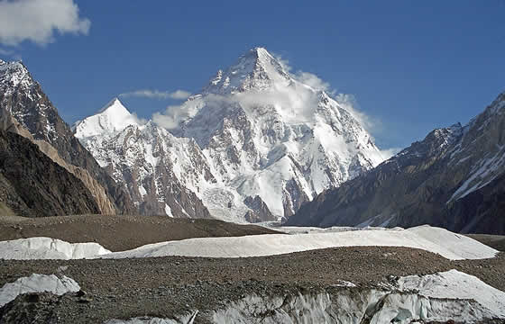 view of snow-covered mountain from mountains nearby