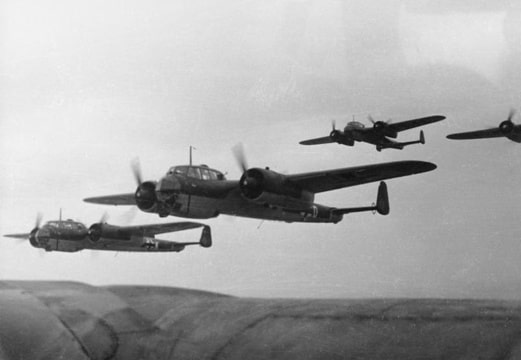 historic photo of early fighter planes in flight