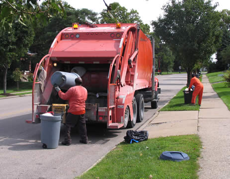garbage collectors and their vehicle