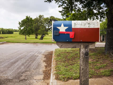 a mailbox painted like the American flag