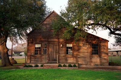 a small building made of logs