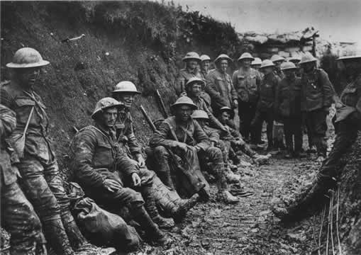 black and white photo of soldiers in a trench