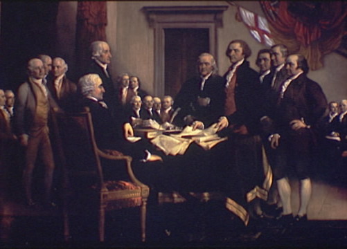 a group of men signing the Declaration of Independence at the Second Continental Congress