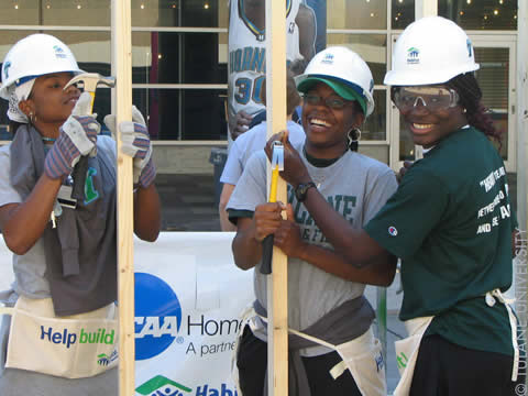 Photograph of three women builders