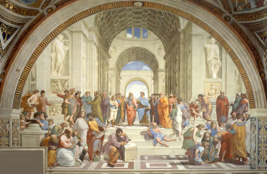 many people in discussion in a grand room