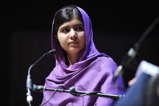 photograph of a young woman in traditional Islamic clothing