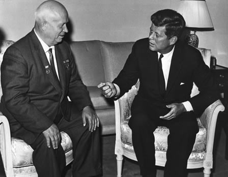two men hold a discussion