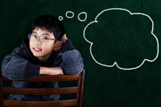 a child on a chair, thinking