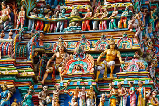 highly detailed and colorful carving