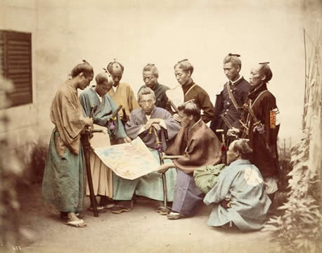 many people studying a map