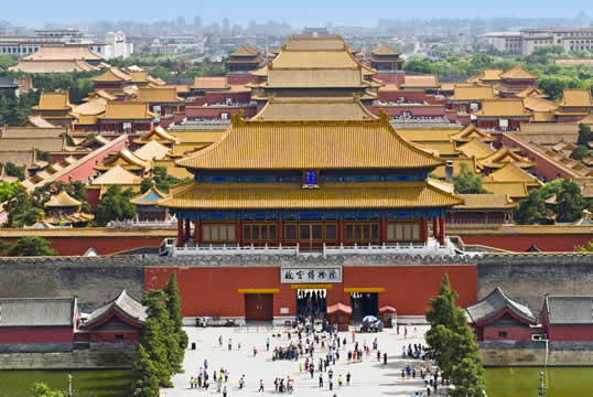 photograph of pagodas and people from the air