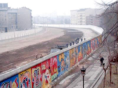 long, high decorated wall separates two streets